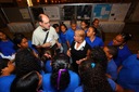 Peter gives a quick talk to a school group touring the poster
session.